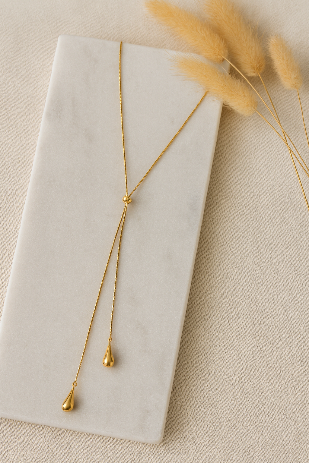 The Golden Teardrop Lariat Stainless Steel Necklace